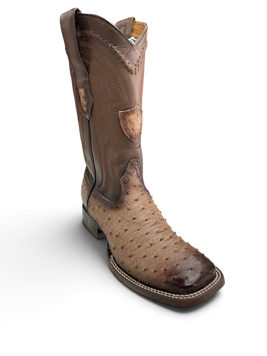 Botas vaqueras Botas El Pistolero PYP de piel de avestruz café con punta cuadrada y detalles de costura artesanal.