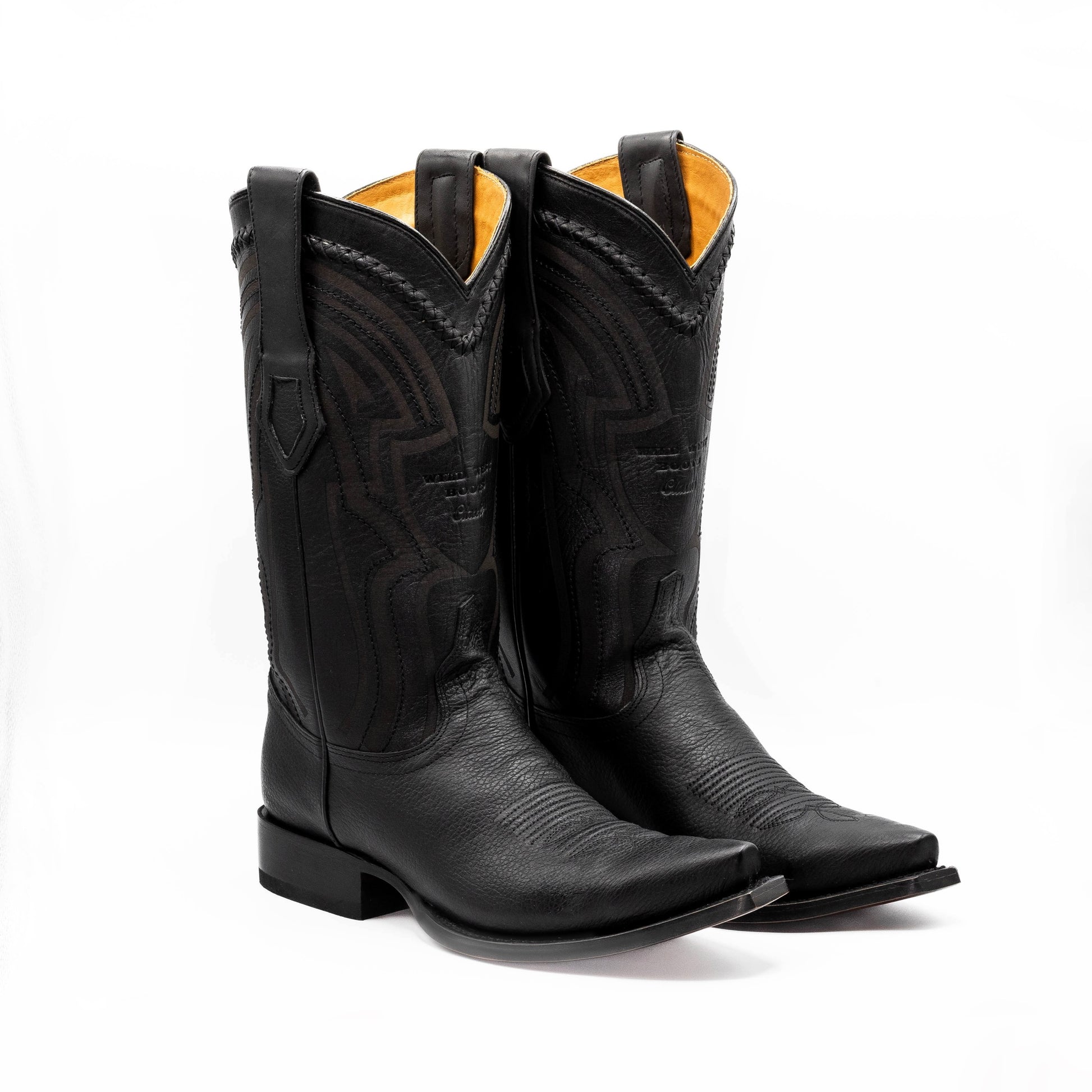 Botas vaqueras Botas El Pistolero PYP de piel de avestruz negra con punta cuadrada y costuras artesanales detalladas.