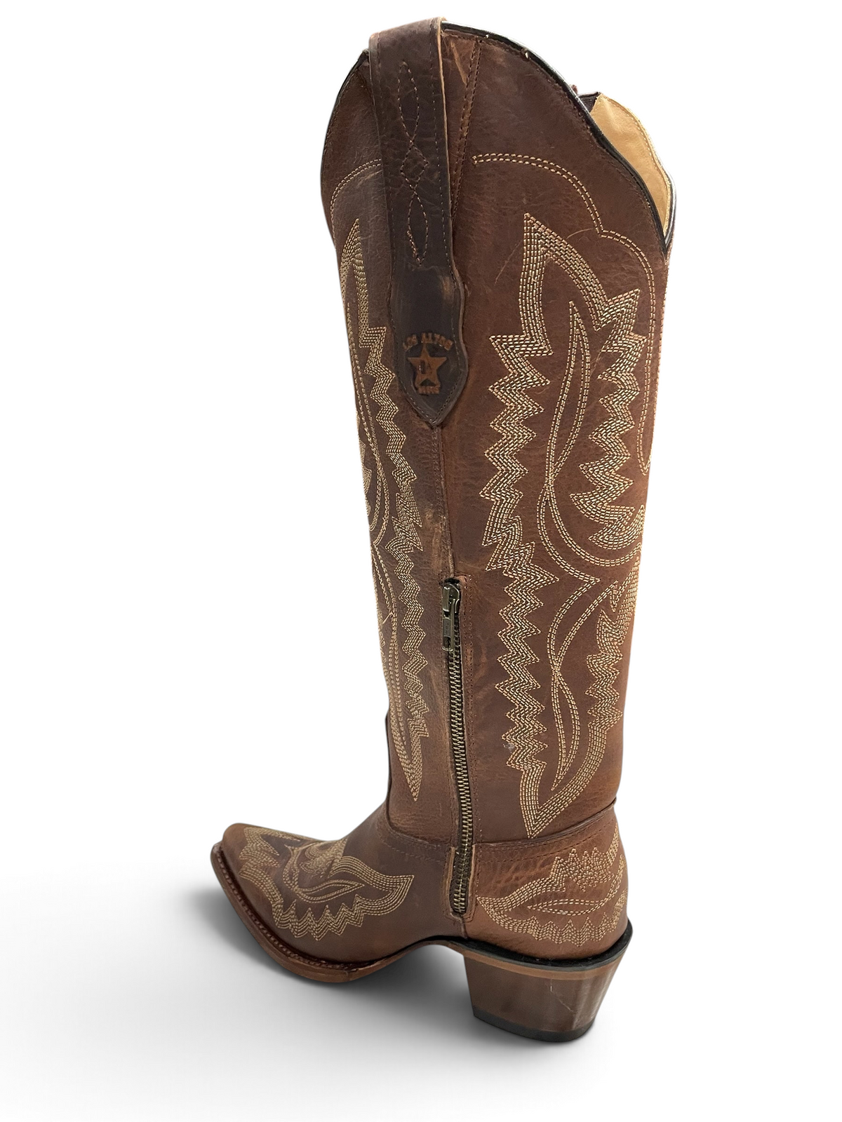 Botas vaqueras Botas El Pistolero PYP de cuero café con bordado detallado, punta cuadrada y cremallera lateral.