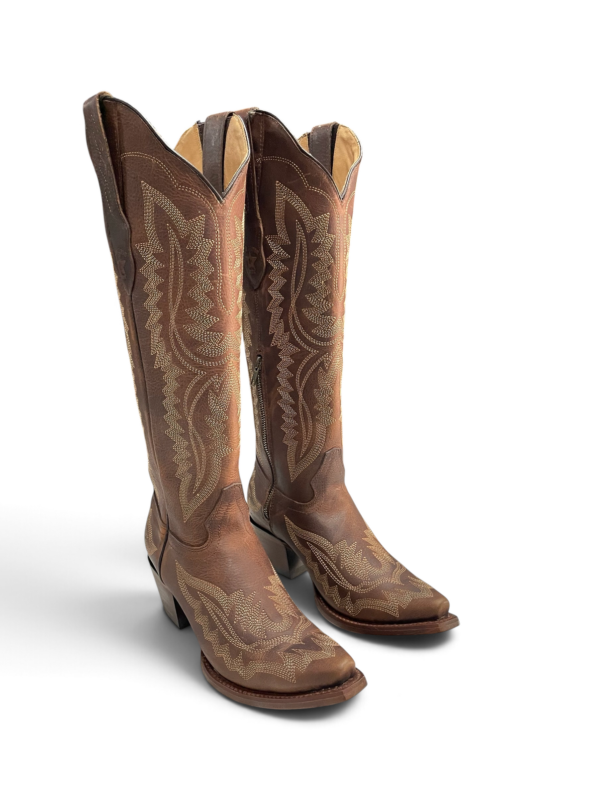 Botas vaqueras Botas El Pistolero PYP de cuero café con bordados detallados, punta cuadrada y cremallera lateral.