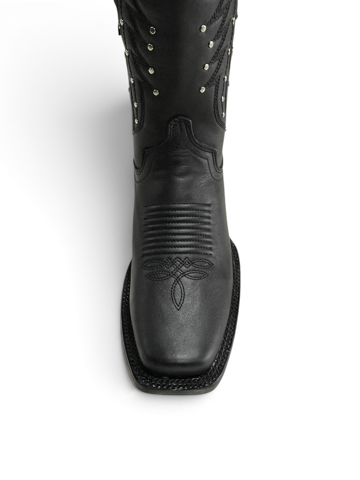 Botas vaqueras Botas El Pistolero PYP de cuero negro con punta cuadrada y detalles de estoperoles metálicos.