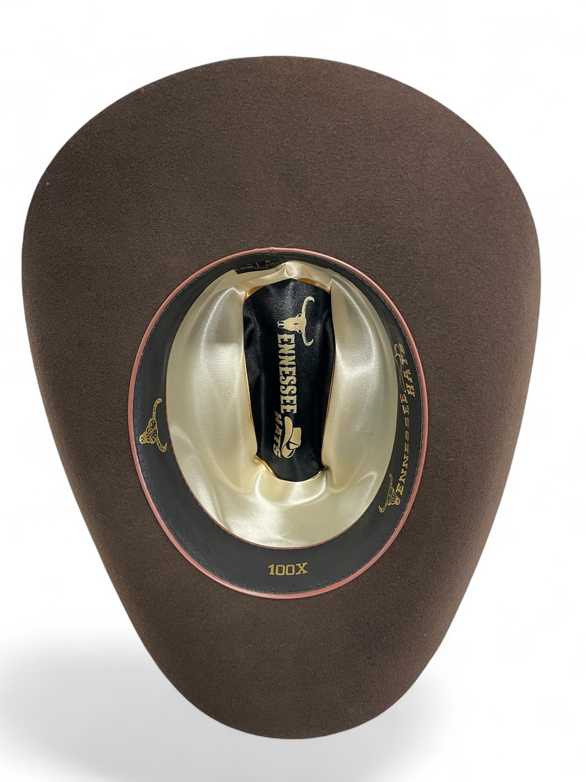 Interior del sombrero vaquero Botas El Pistolero PYP de fieltro café 100X con forro de satén dorado y marca Tennessee